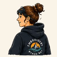 Person wearing an embroidered fashion hoodie, seen from behind